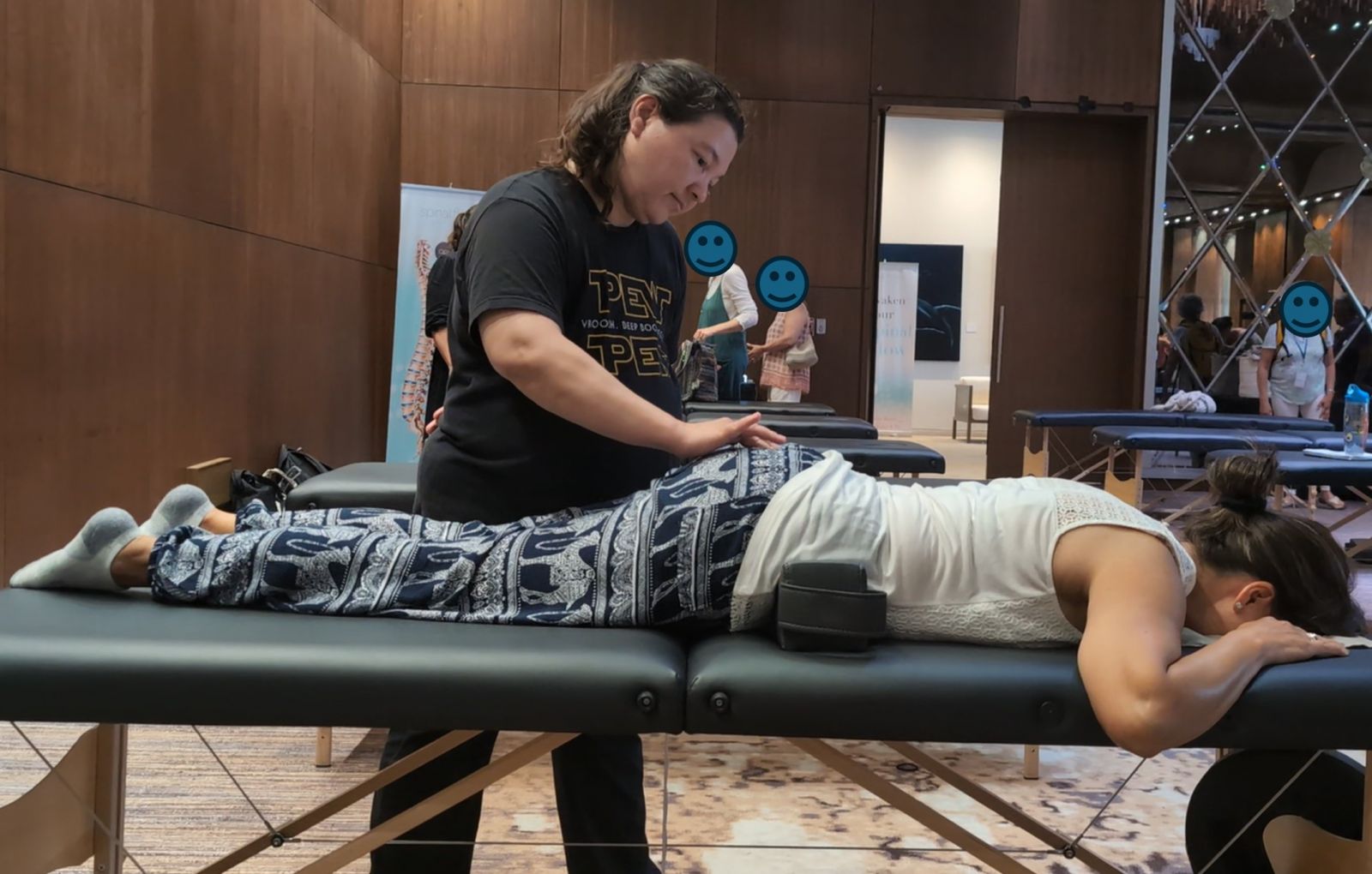 Lynne is making contact with an access point on a client's sacrum